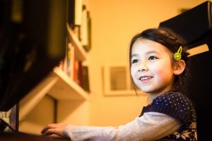 girl sitting at computer